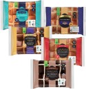 Woolworths-Indulgent-Hot-Cross-Buns-Caramalised-Biscuit-Filled-Cinnabon-Cadbury-Caramello-Filled-Cadbury-Caramilk-Chips-or-Mudcake-Filled-4-Pack Sale